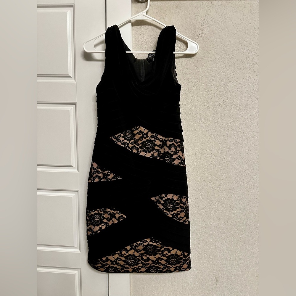 Gorgeous fitted black and lace dress.